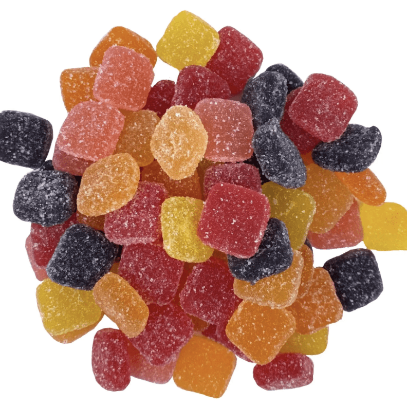 A pile of gummy bears sitting on top of each other.